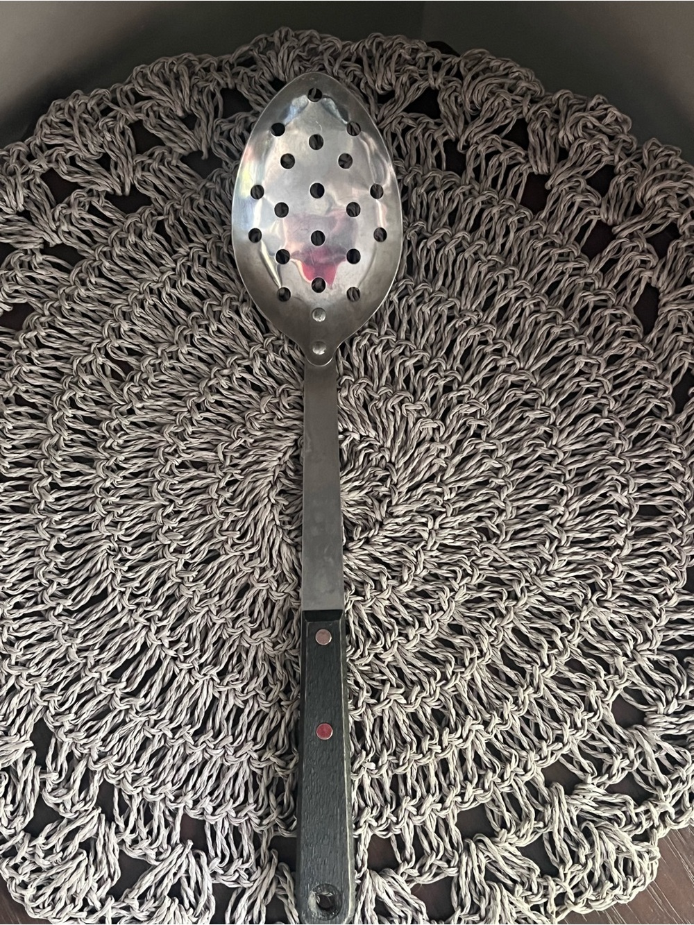 Vintage MCM Stainless Steel Slotted Serving Spoon with Black Handle